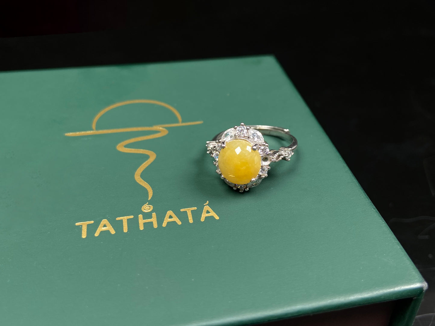 A ambered primrose gleam jadeite ring.