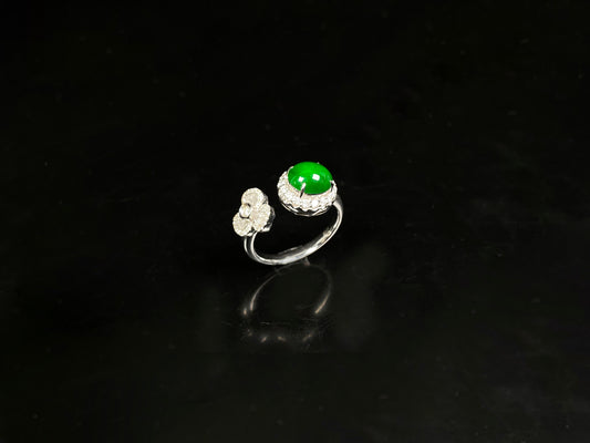 A vivid imperial green halo jadeite ring.