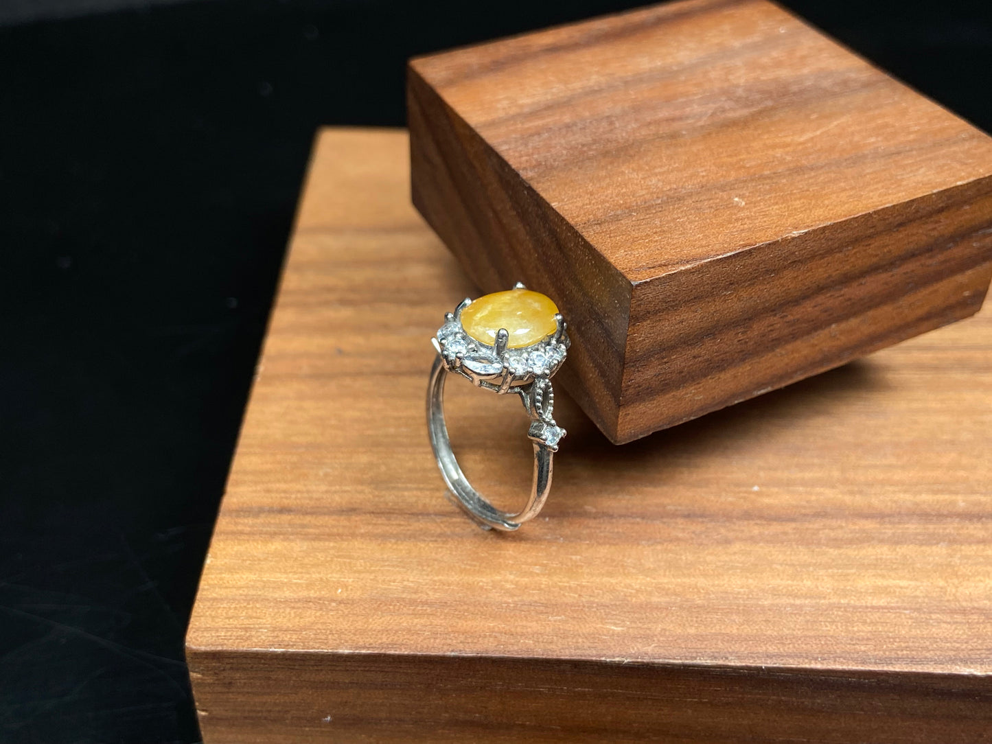 A sunlit marigold drop jadeite ring.