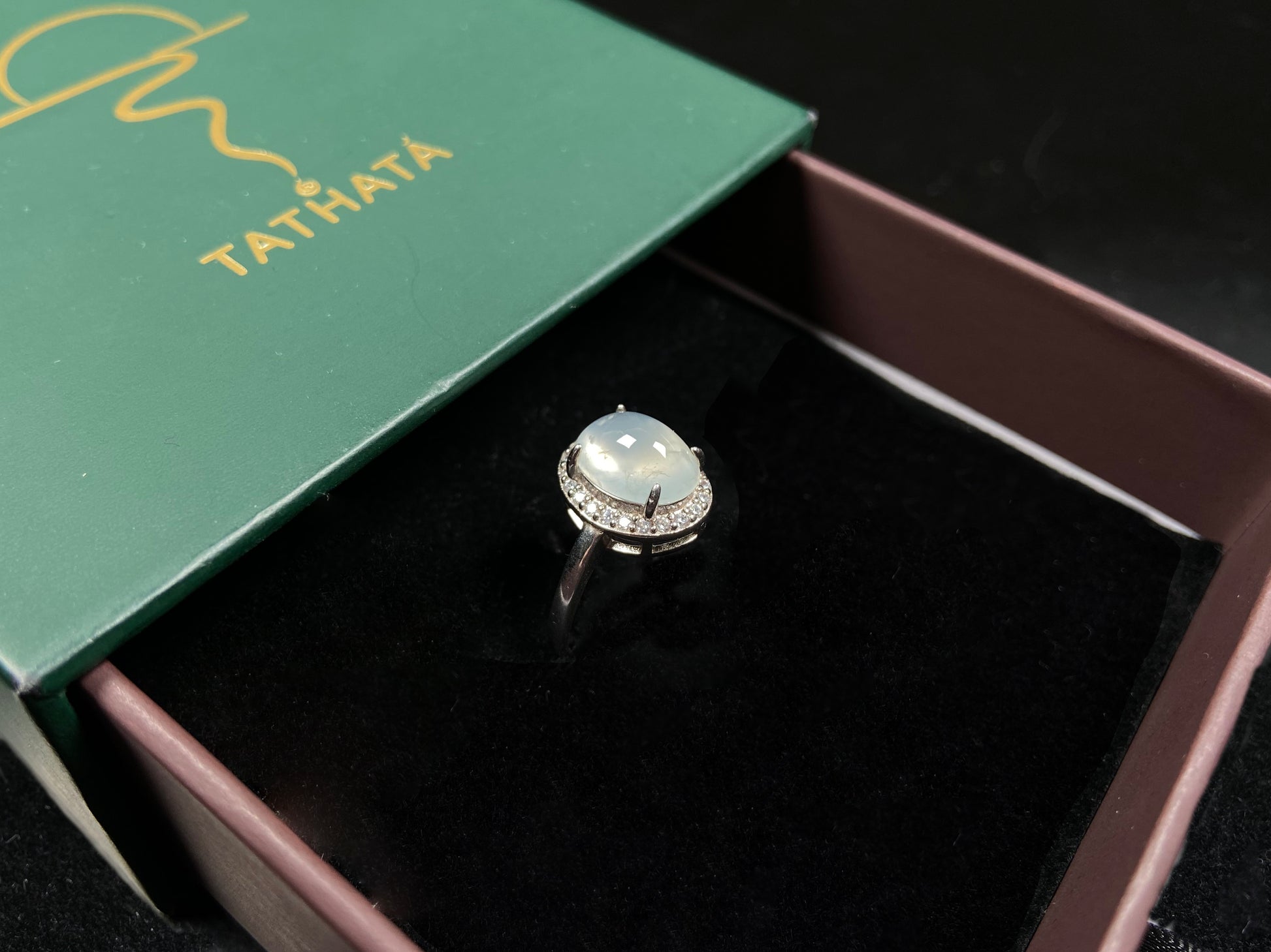 A frosted white luster jadeite ring.