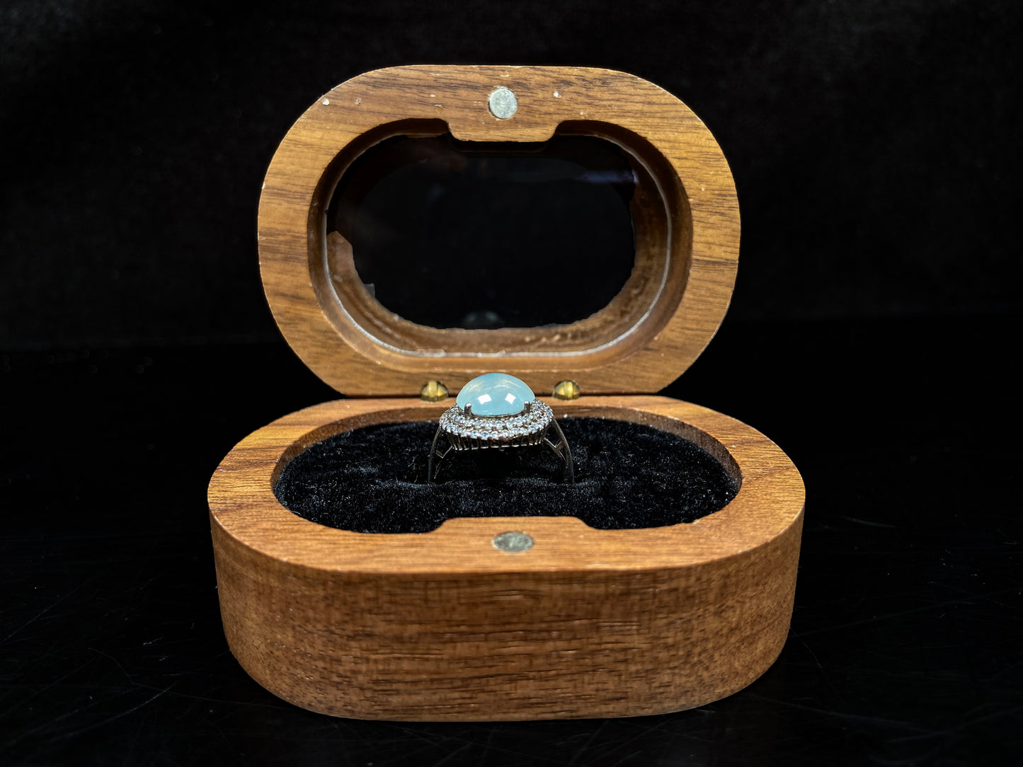 A double halo frost glow jadeite ring.