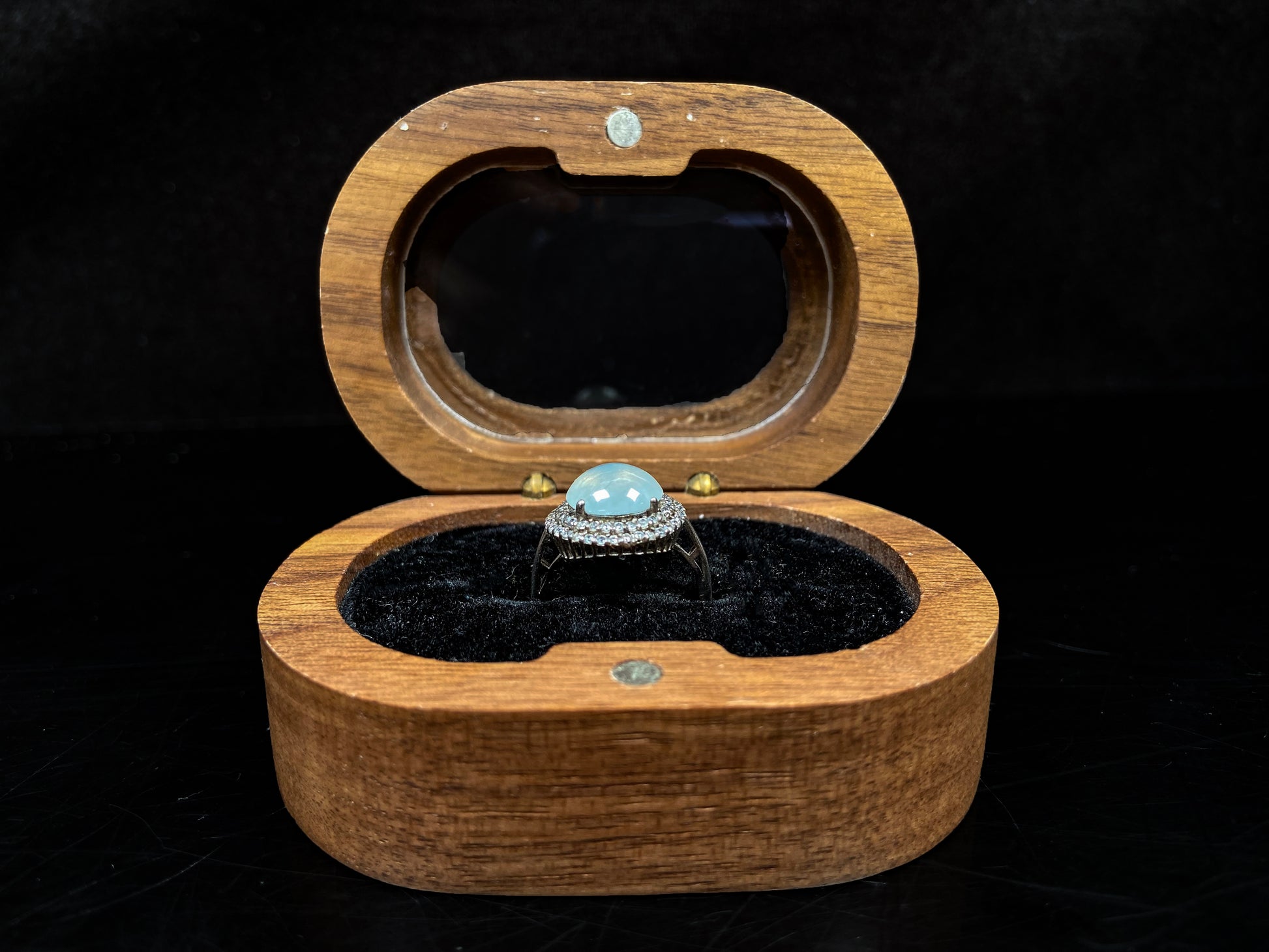 A double halo frost glow jadeite ring.