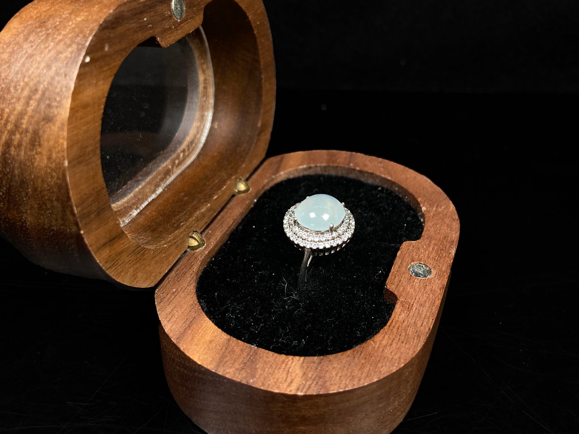 A double halo frost glow jadeite ring.
