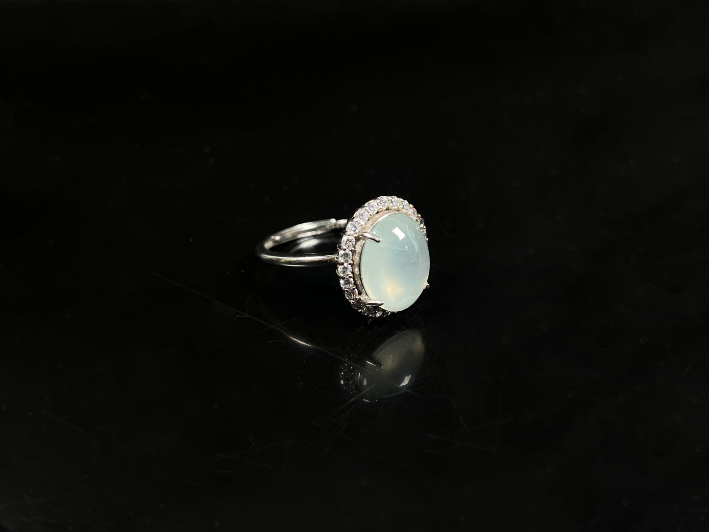 A moonlit frost glimmer jadeite ring.