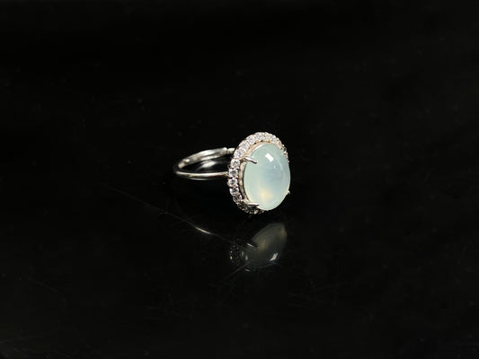 A moonlit frost glimmer jadeite ring.