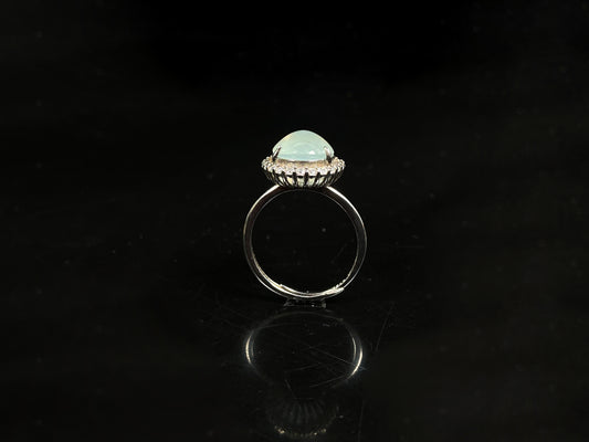 A moonlit frost glimmer jadeite ring.