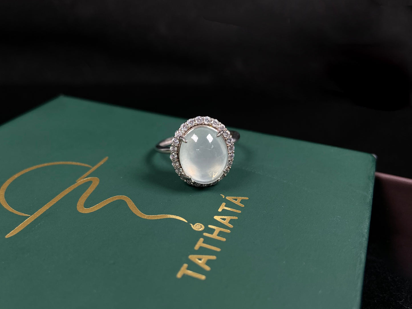 A moonlit frost glimmer jadeite ring.
