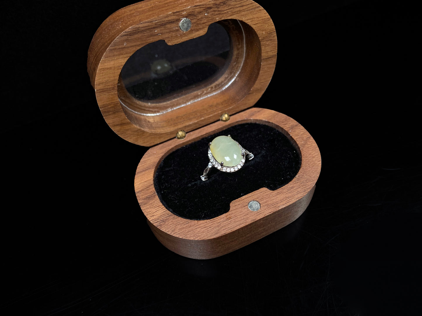 A  pale yellow icy clarity jadeite ring.