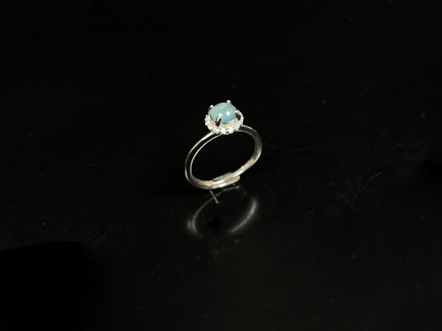 A icy sky blue glow jadeite ring.