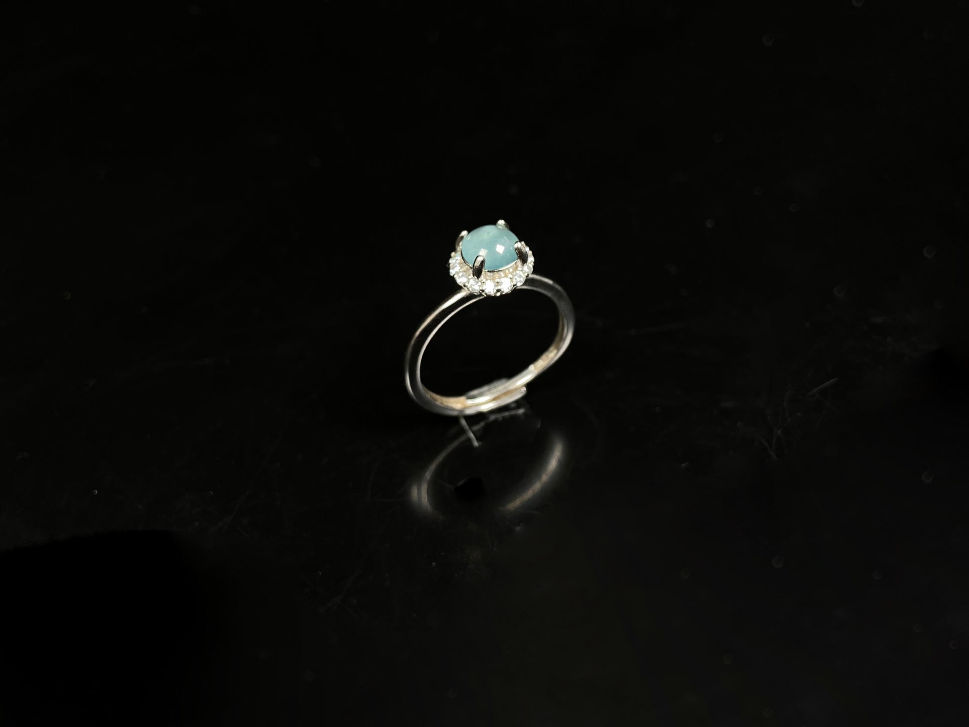 A icy sky blue glow jadeite ring.
