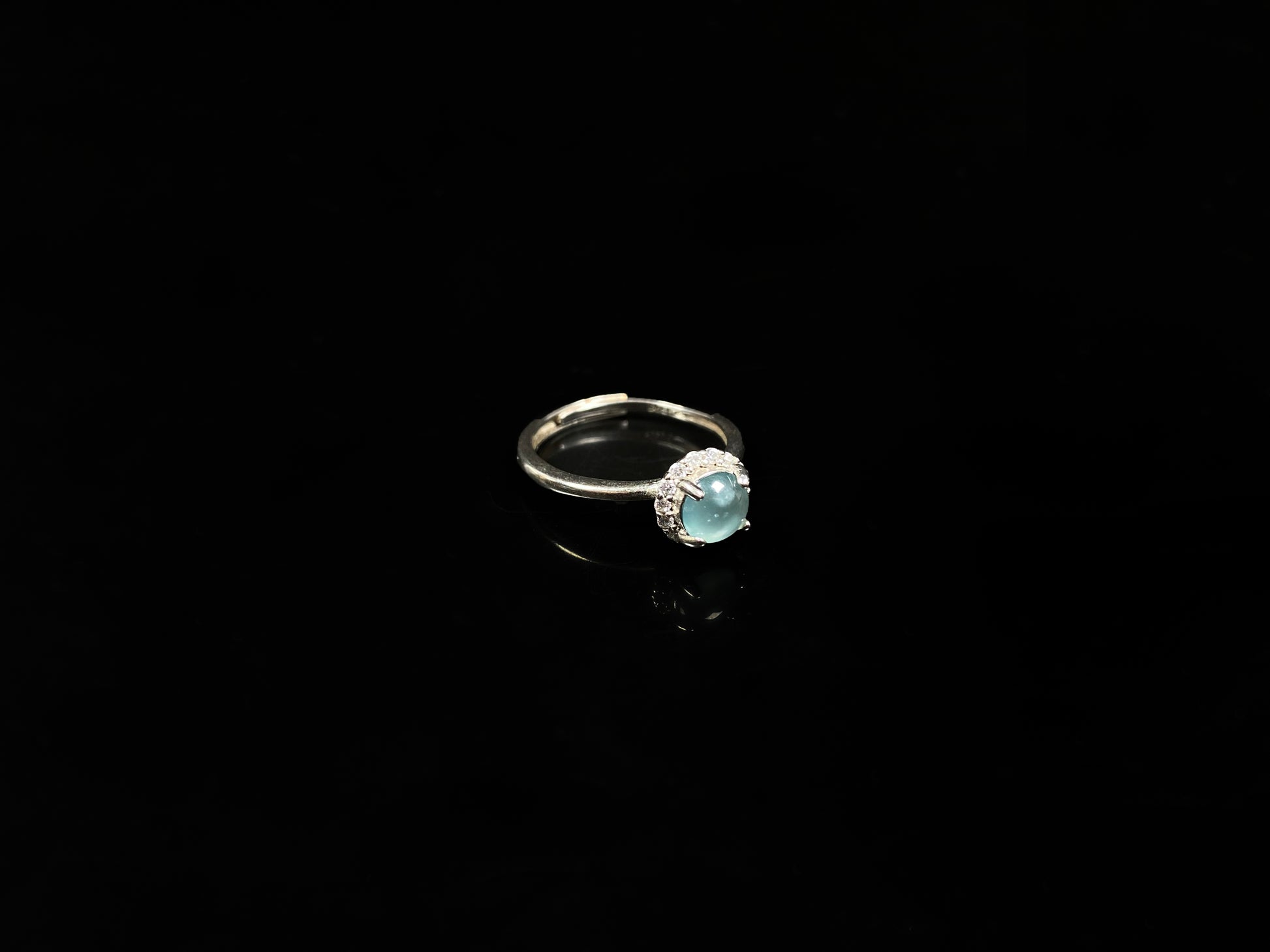 A icy sky blue glow jadeite ring.