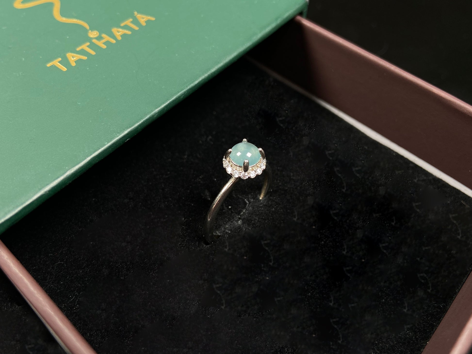 A icy sky blue glow jadeite ring.