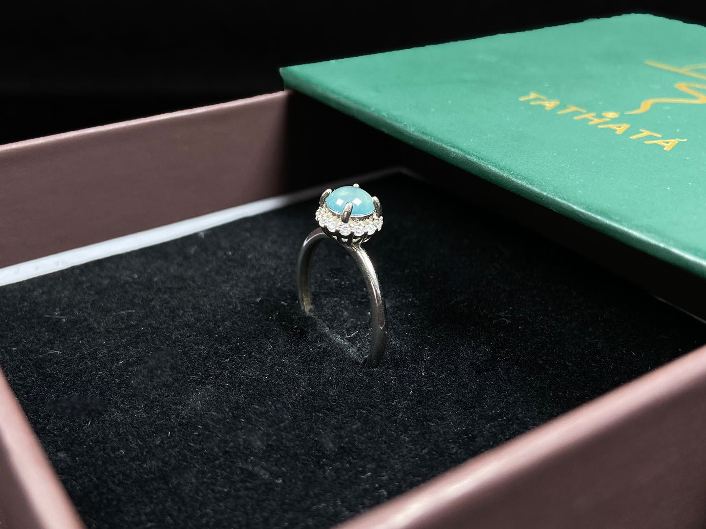 A icy sky blue glow jadeite ring.