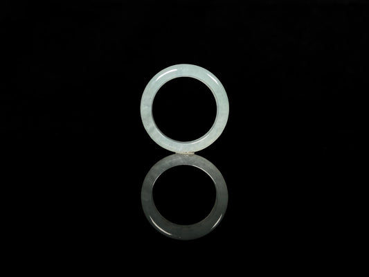 A transparent icy white jadeite ring.
