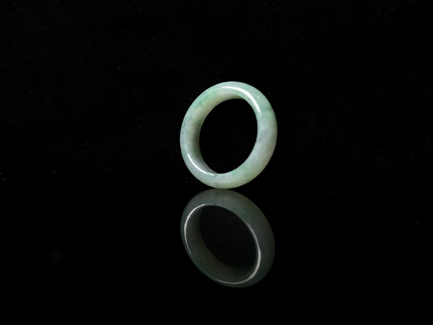 A green glow misty jadeite ring.