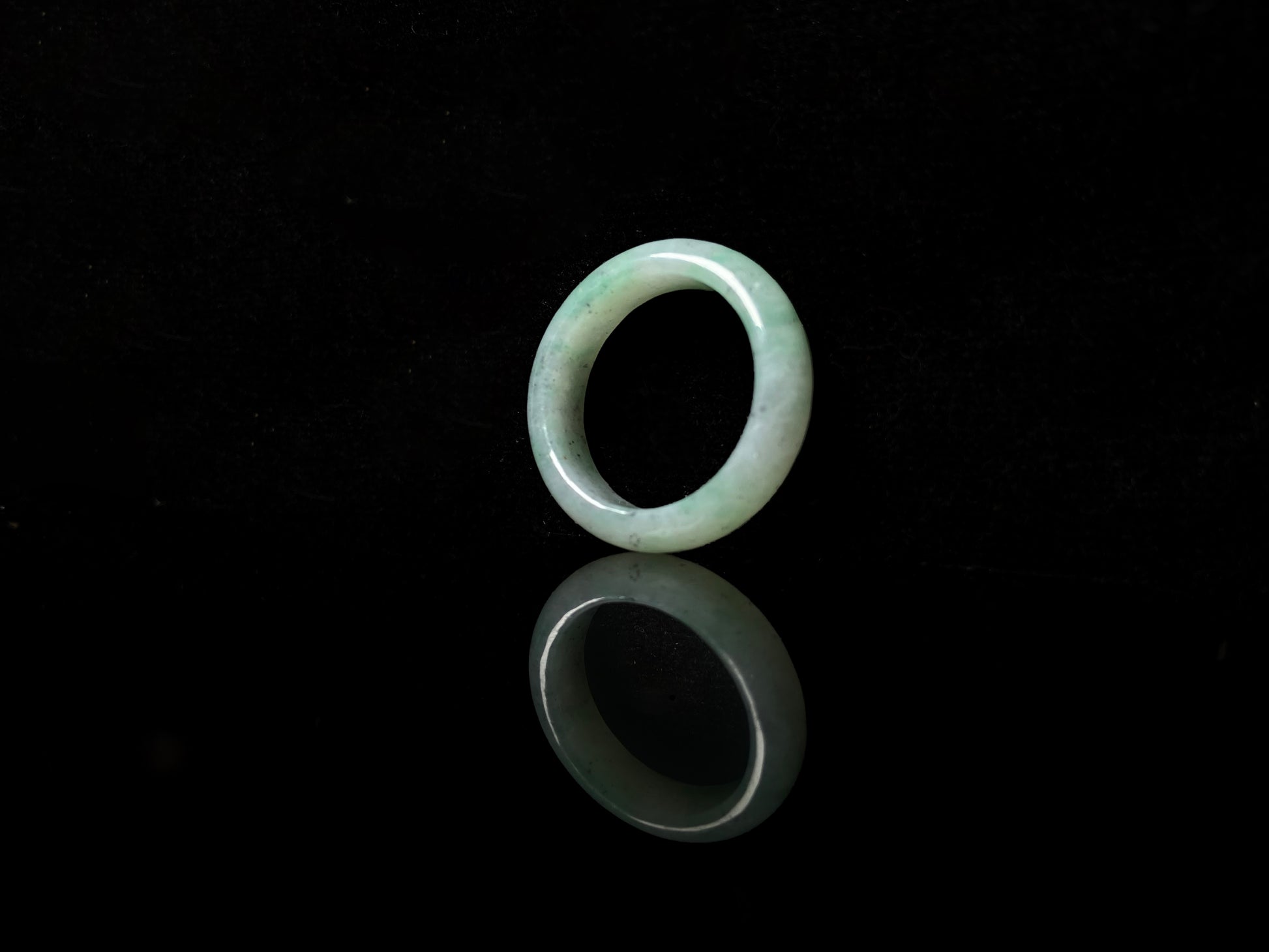A green glow misty jadeite ring.