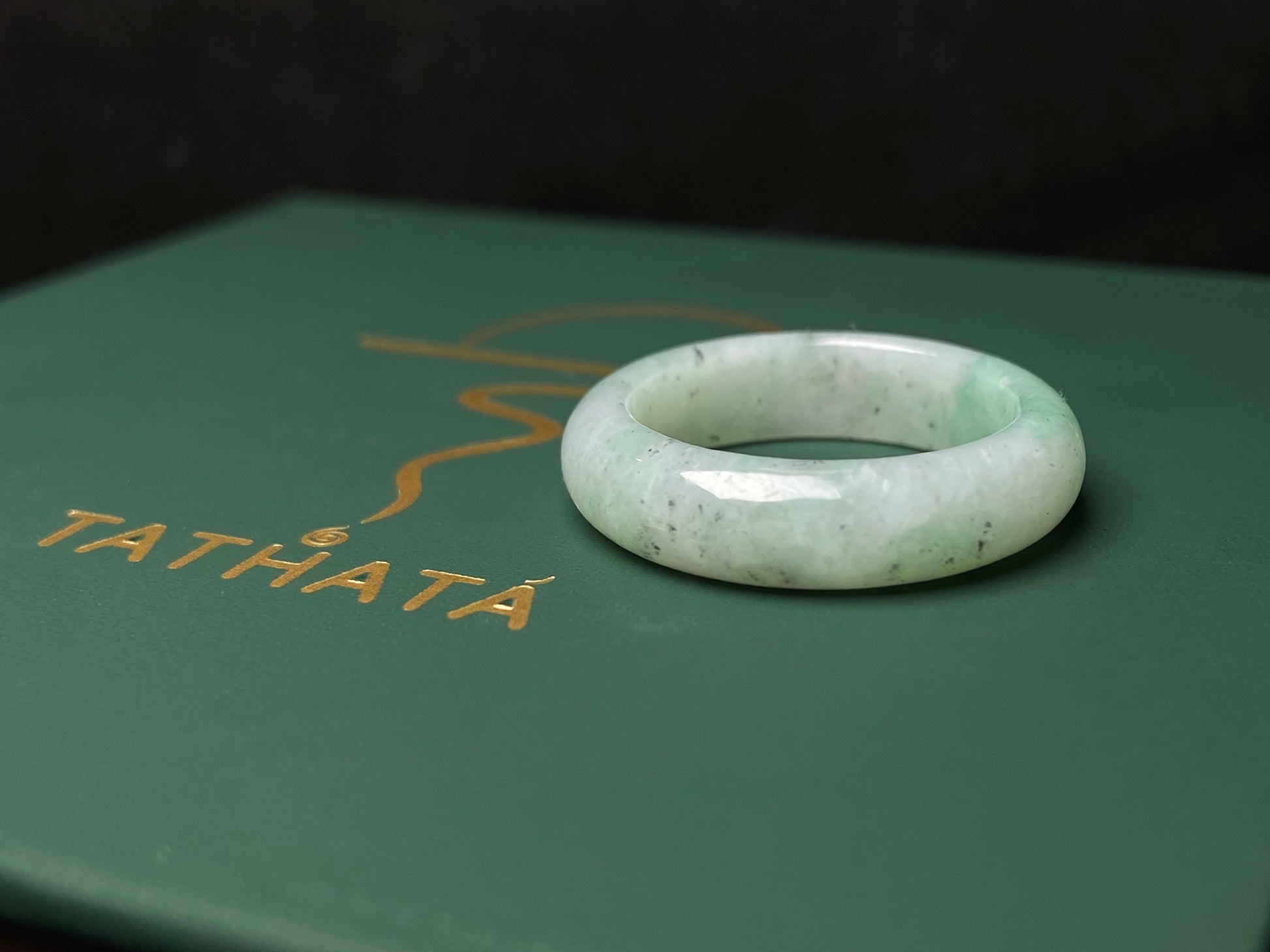 A green glow misty jadeite ring.