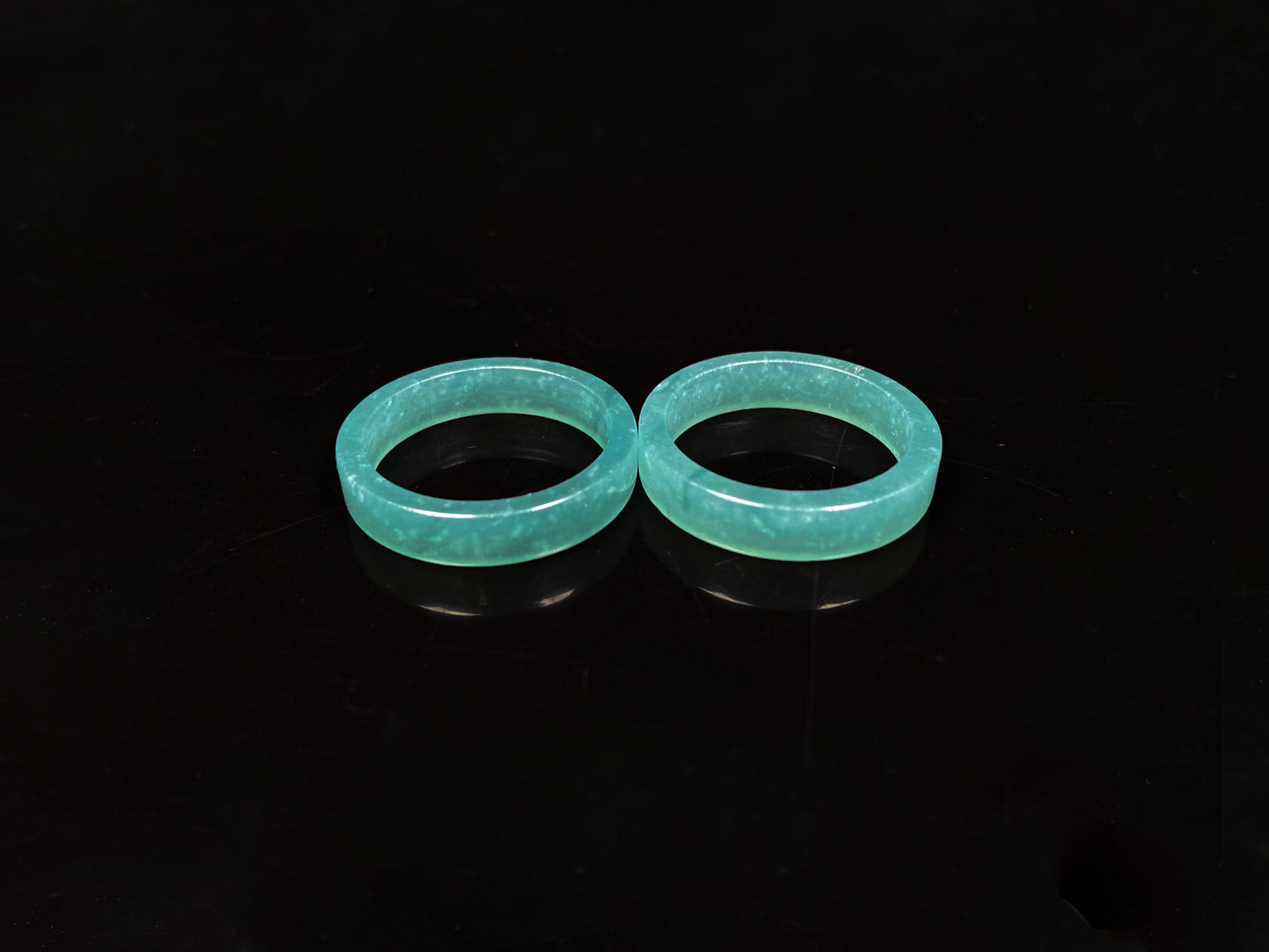 A icy teal mist hush jadeite ring.