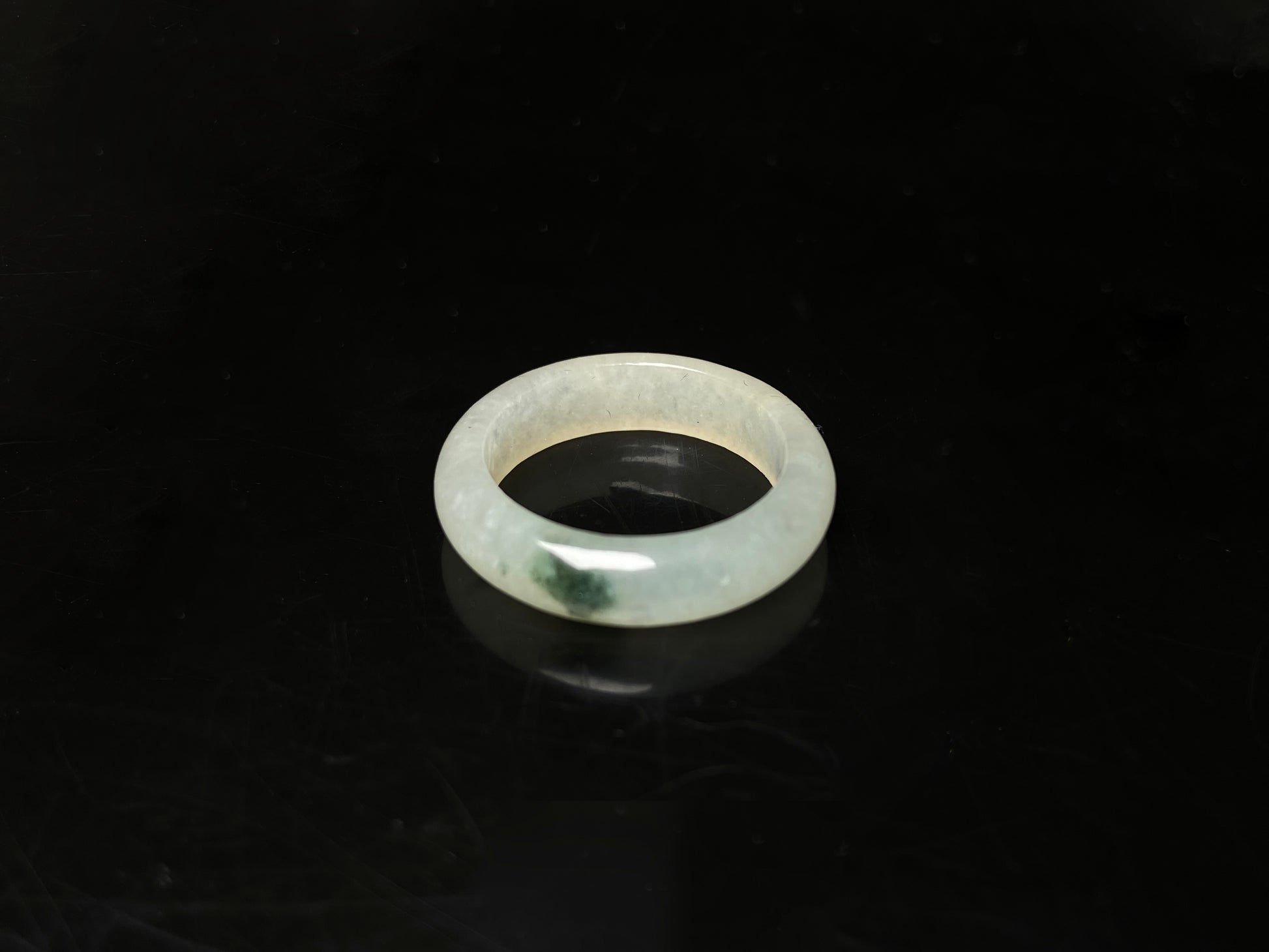 A misty green spot jadeite ring.