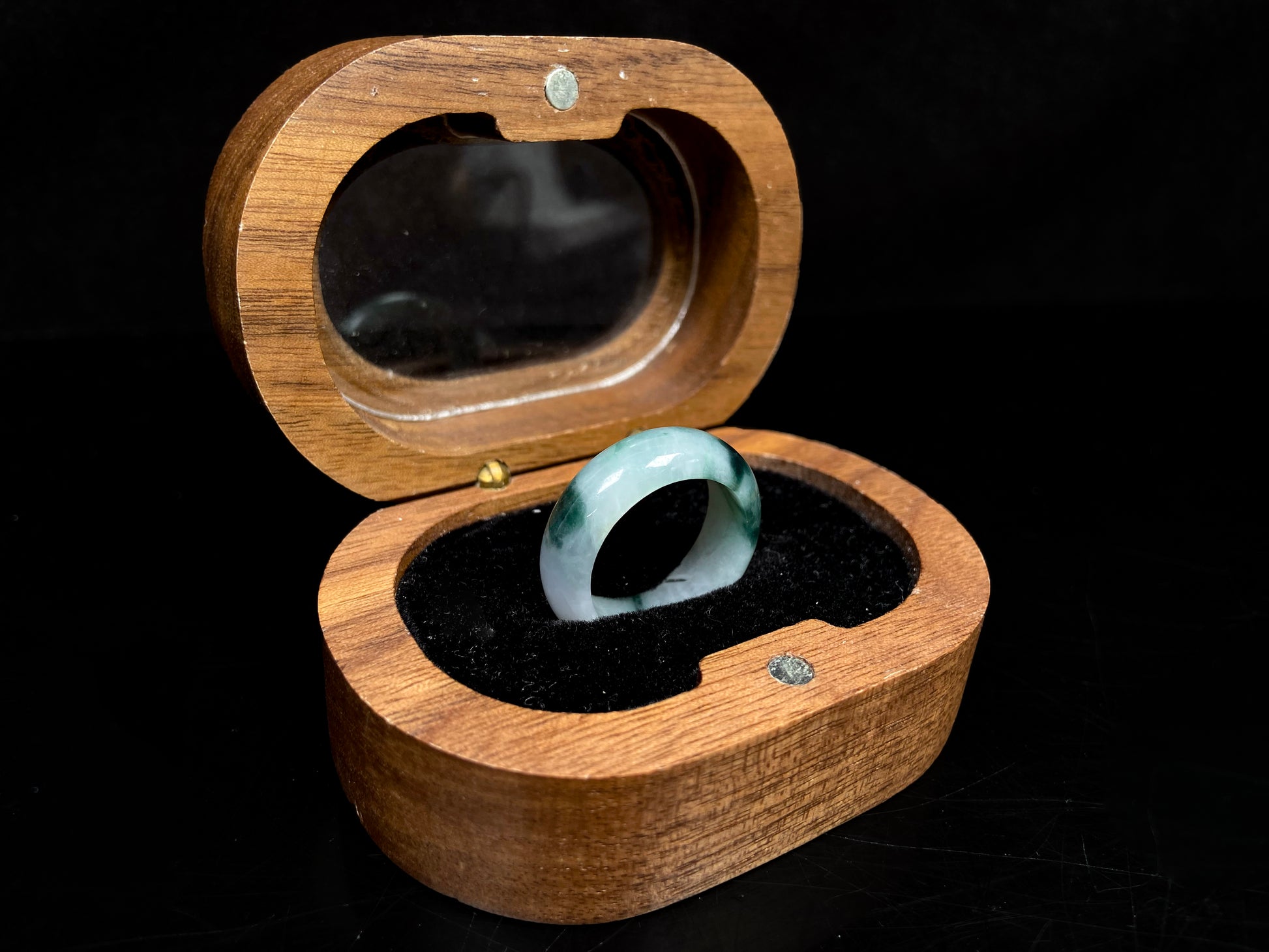 A swirling green ink veil jadeite ring.