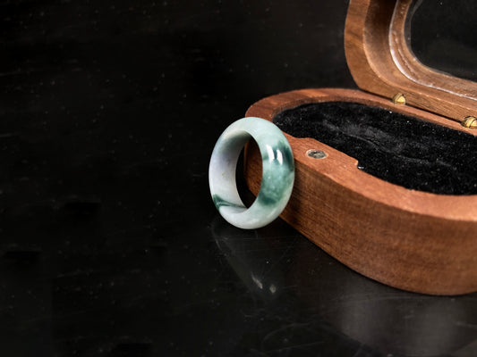 A swirling green ink veil jadeite ring.