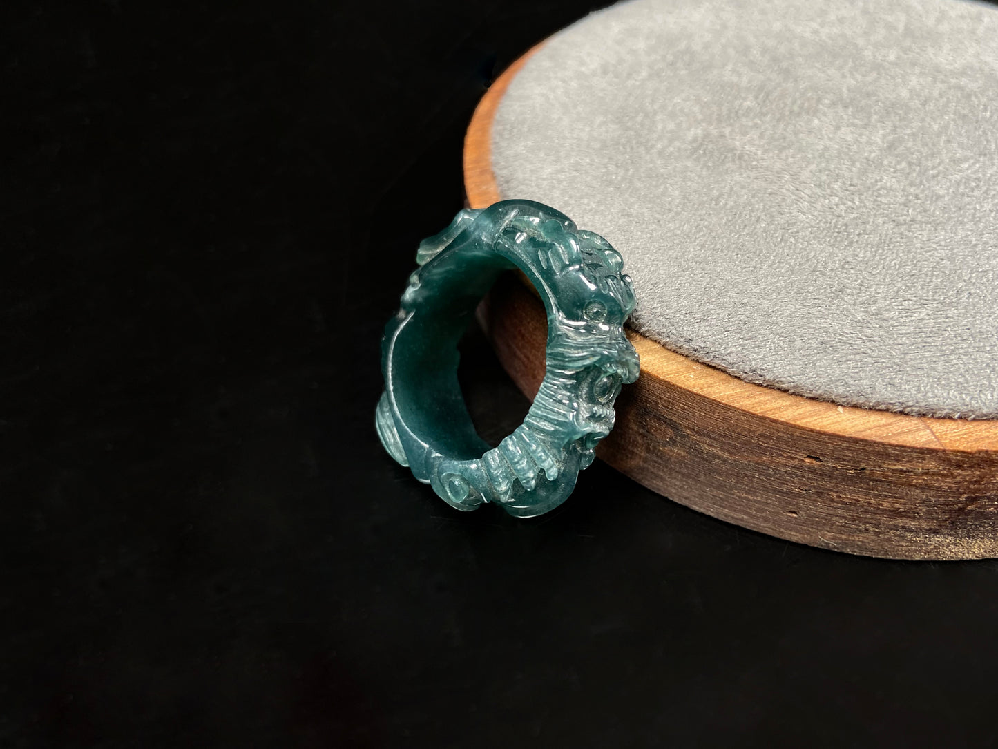 A ocean blue dragon jadeite ring.