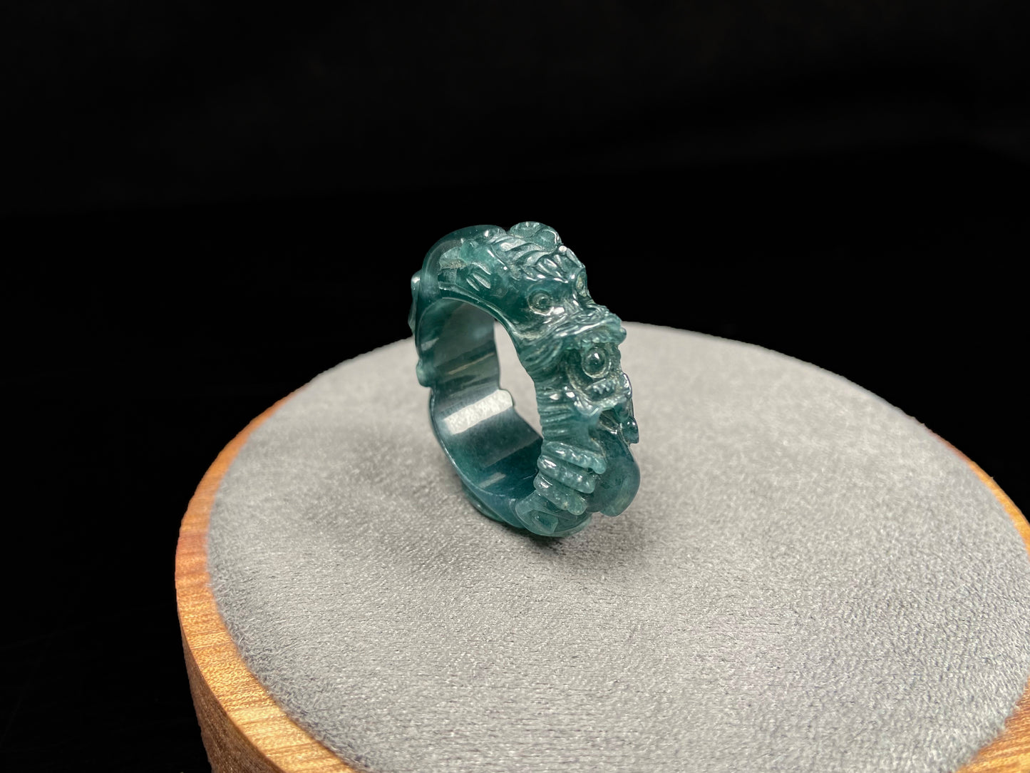 A ocean blue dragon jadeite ring.