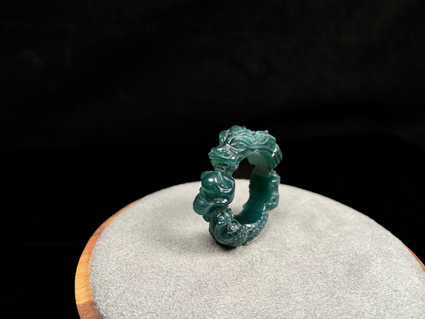 A rich teal dragon jadeite ring.