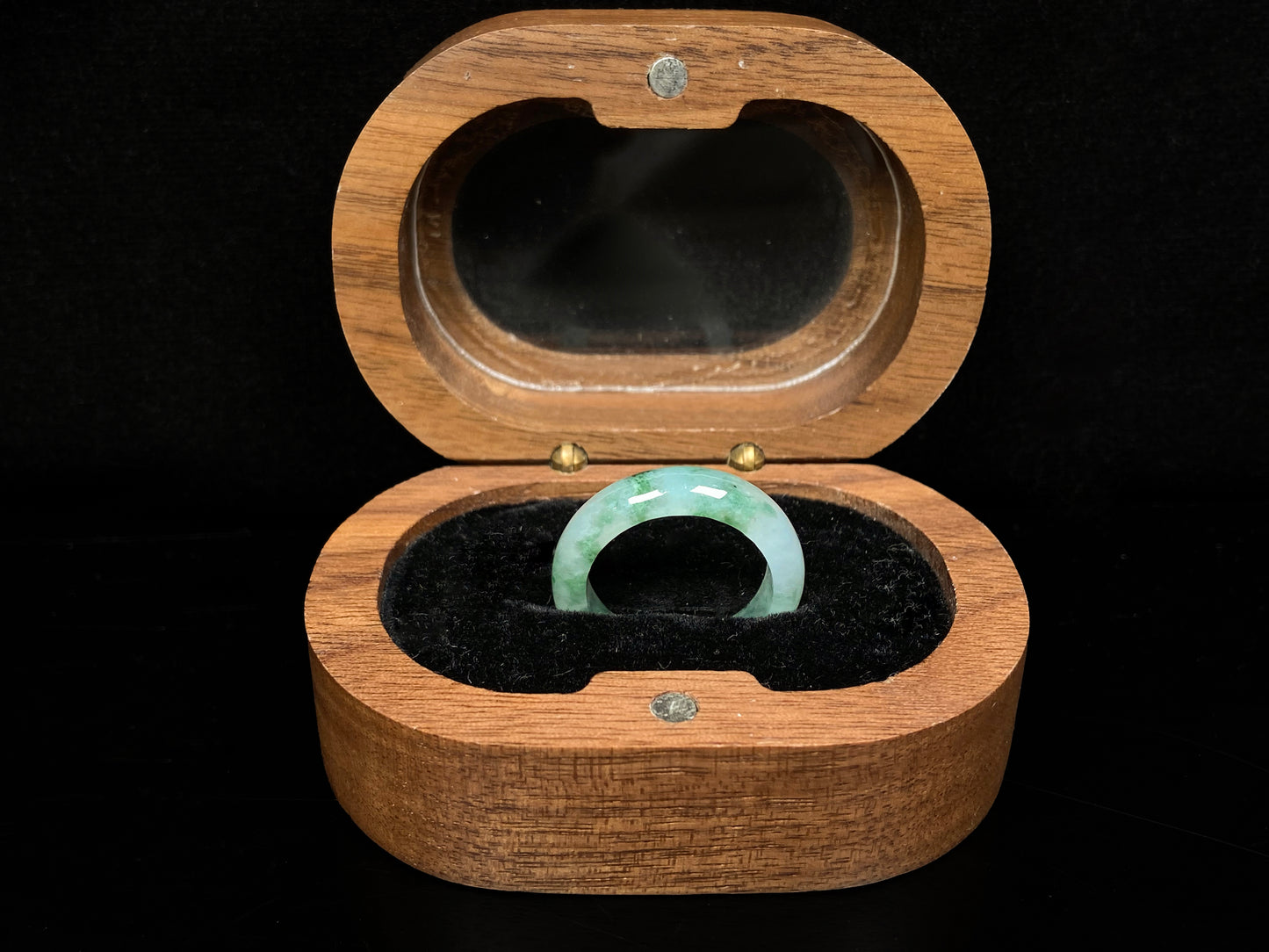 A misty base with green shadow jadeite ring.
