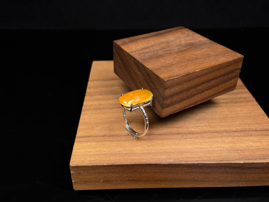 A butterscotch glow saddle jadeite ring.