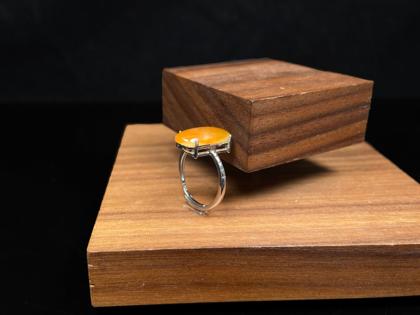 A butterscotch glow saddle jadeite ring.