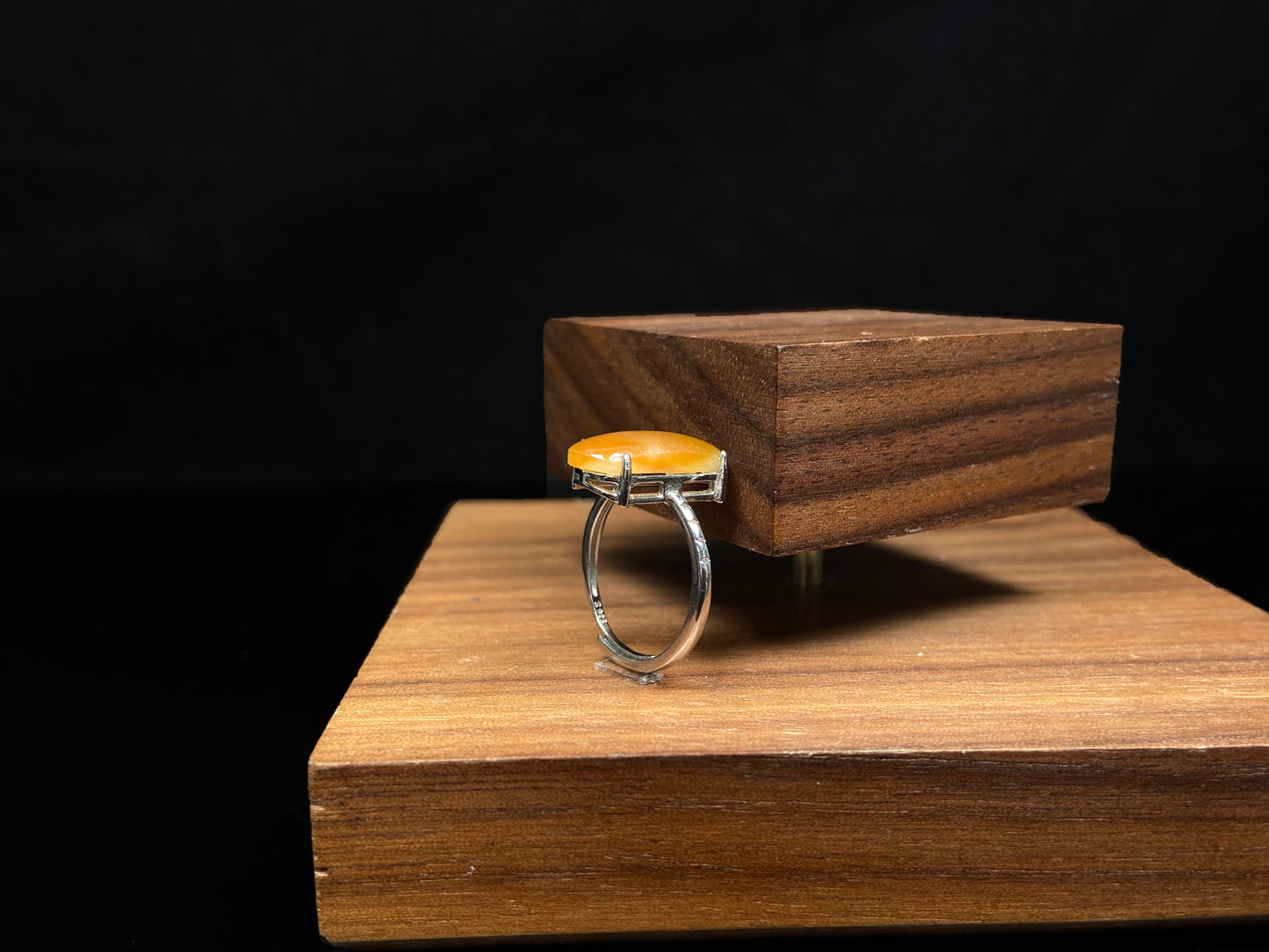 A butterscotch glow saddle jadeite ring.
