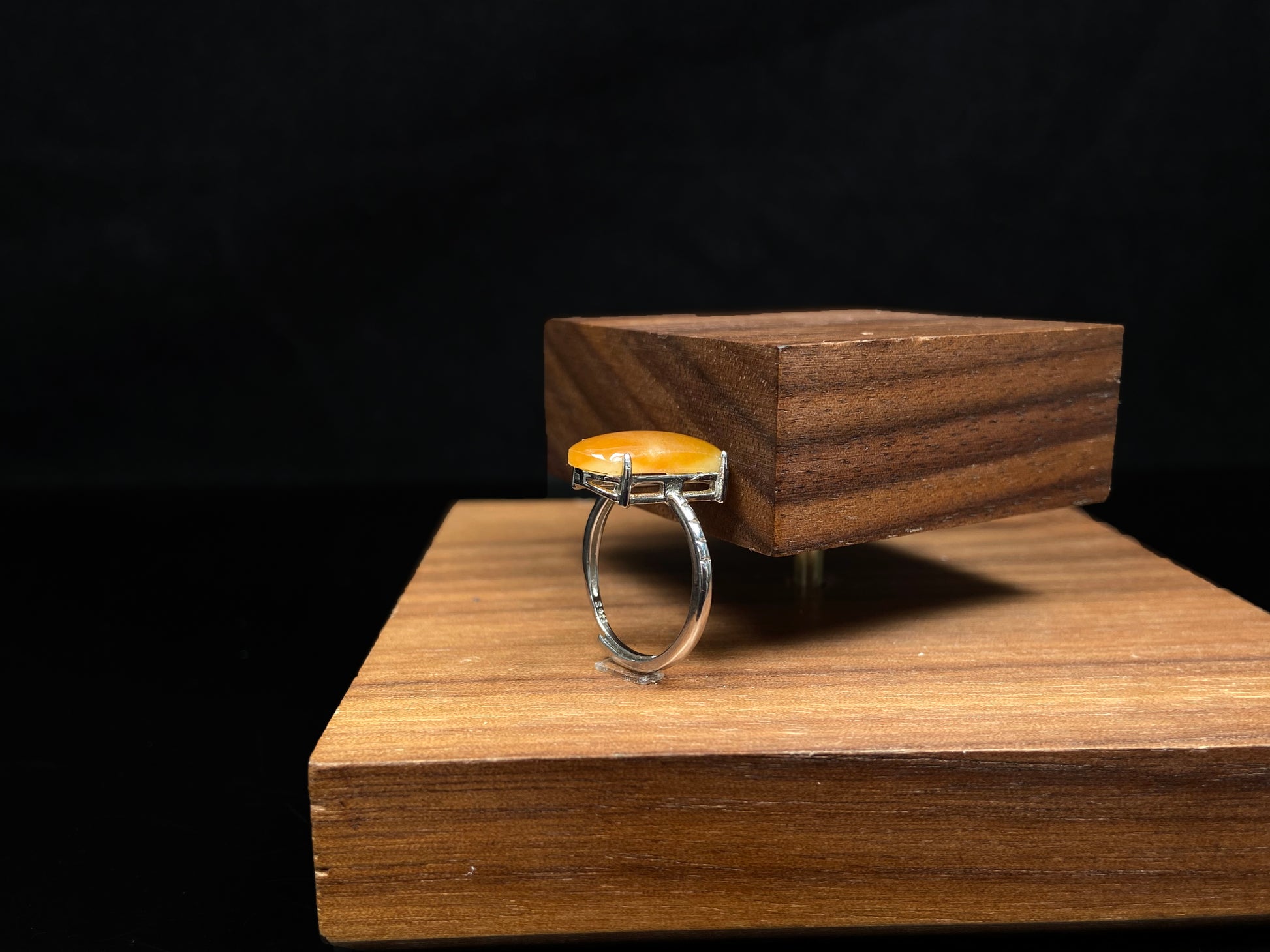 A butterscotch glow saddle jadeite ring.