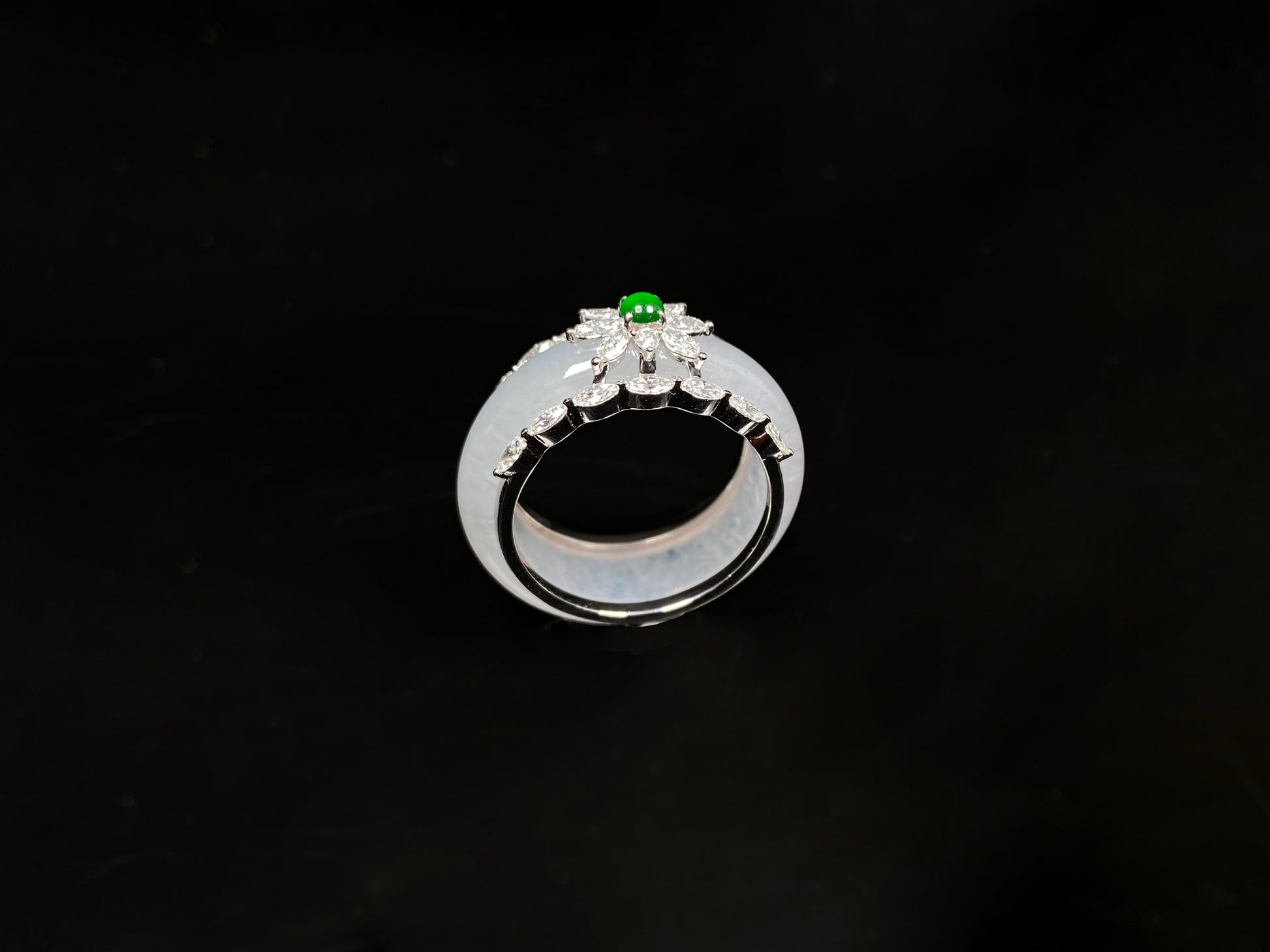 A icy white with green accent jadeite ring.
