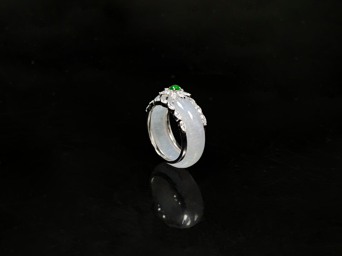 A icy white with green accent jadeite ring.