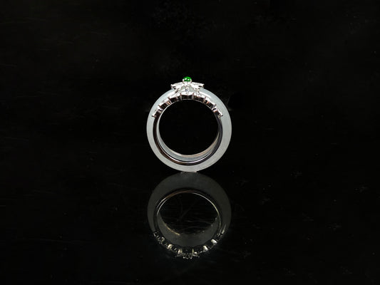 A icy white with green accent jadeite ring.