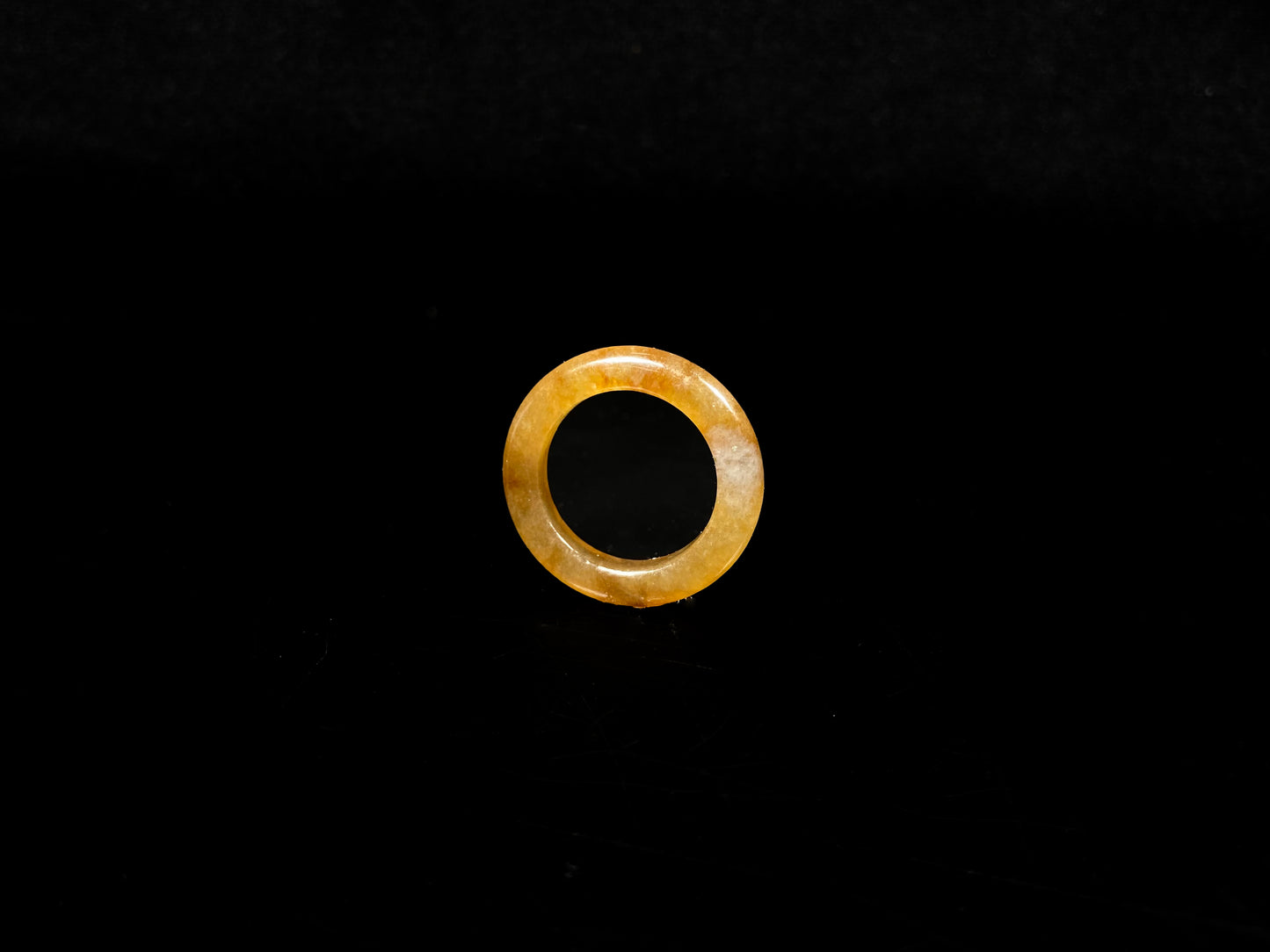 A golden amber glow jadeite ring.