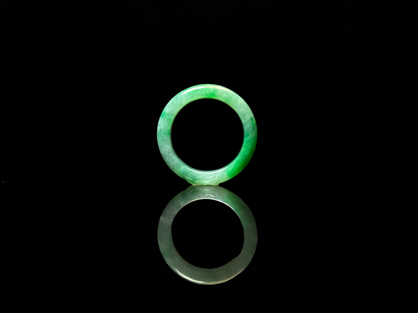 A vivid green mist jadeite ring.