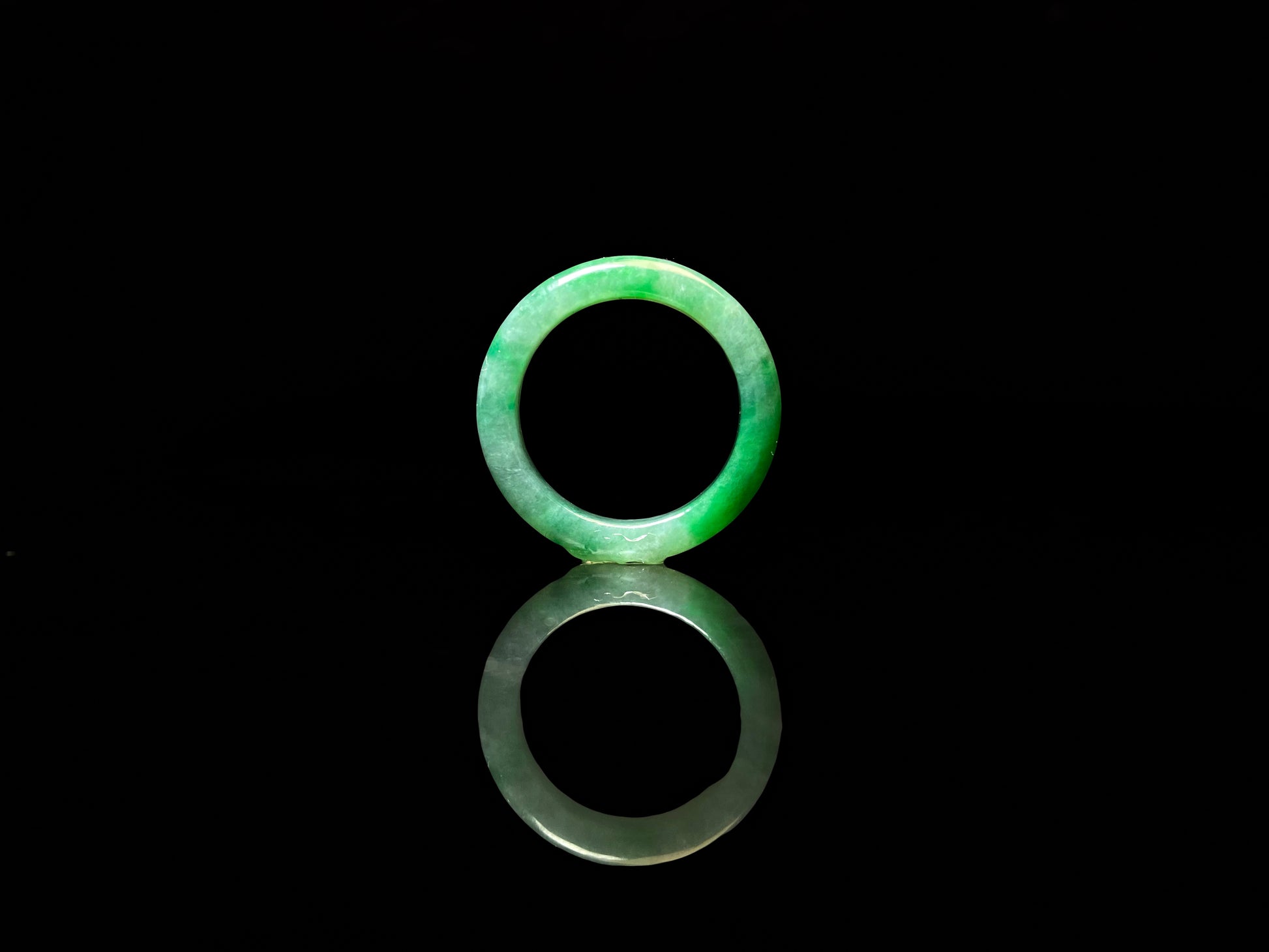 A vivid green mist jadeite ring.