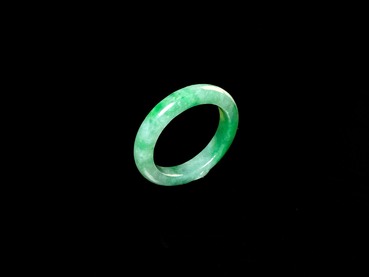 A vivid green mist jadeite ring.