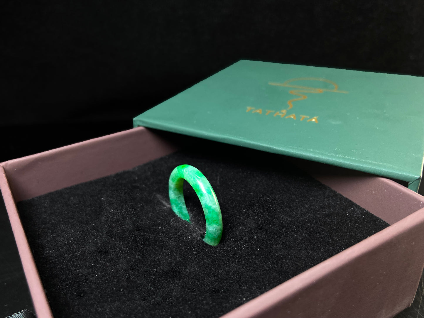 A vivid green mist jadeite ring.
