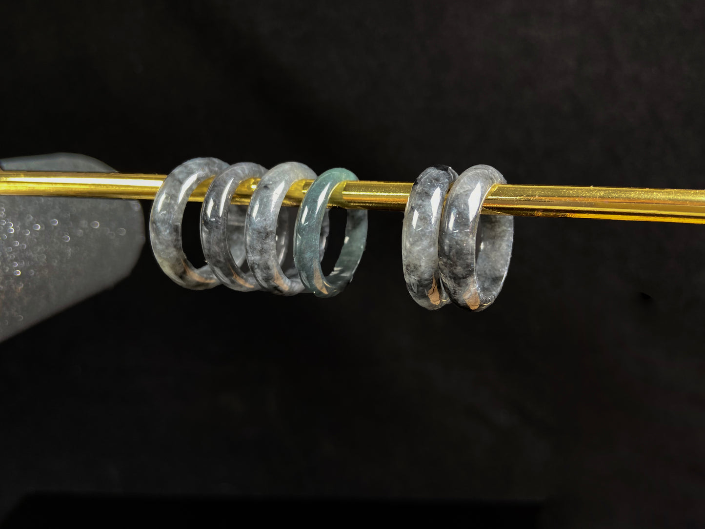 A hazy grey serenity jadeite ring group.