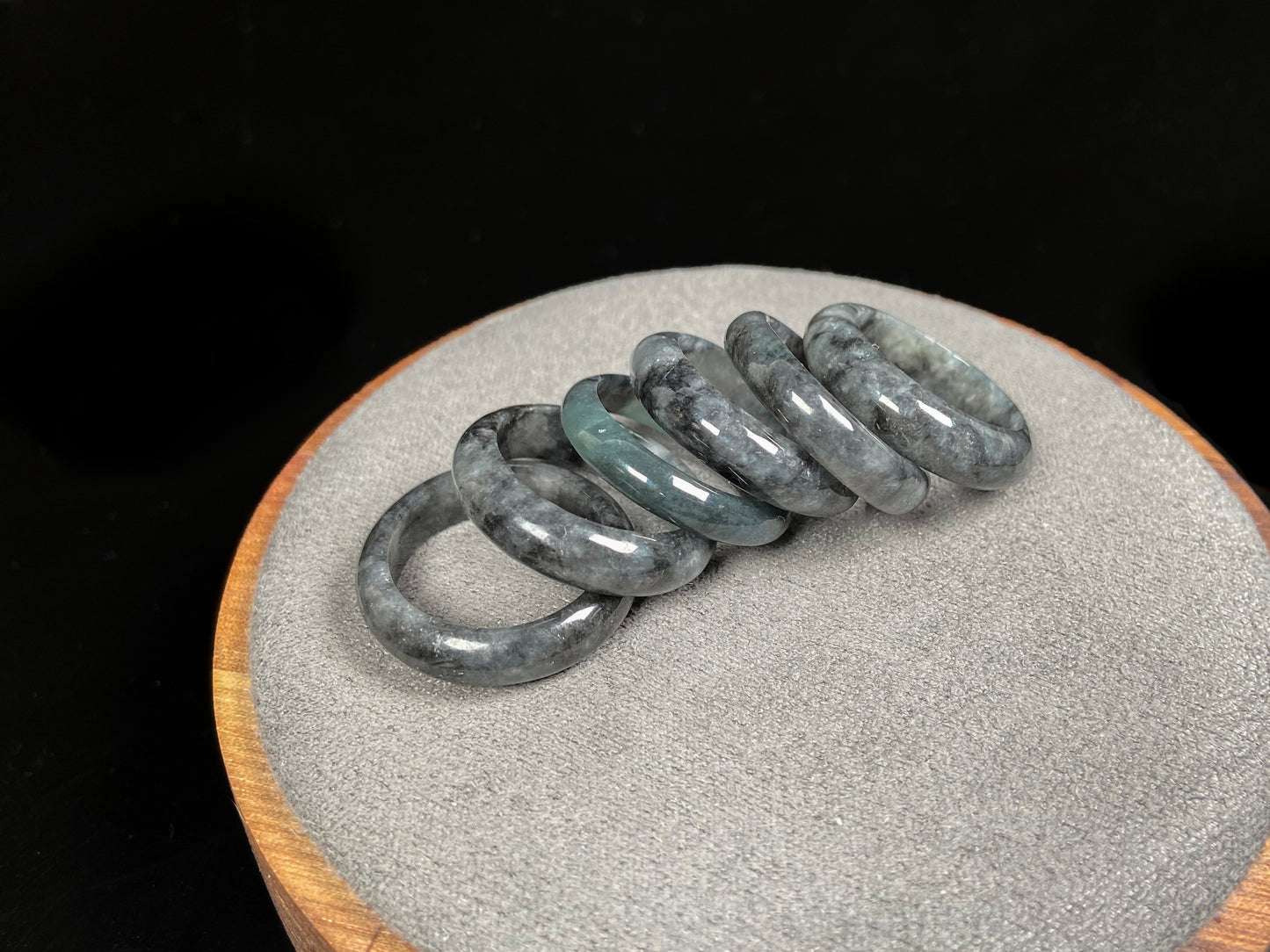 A hazy grey serenity jadeite ring group.