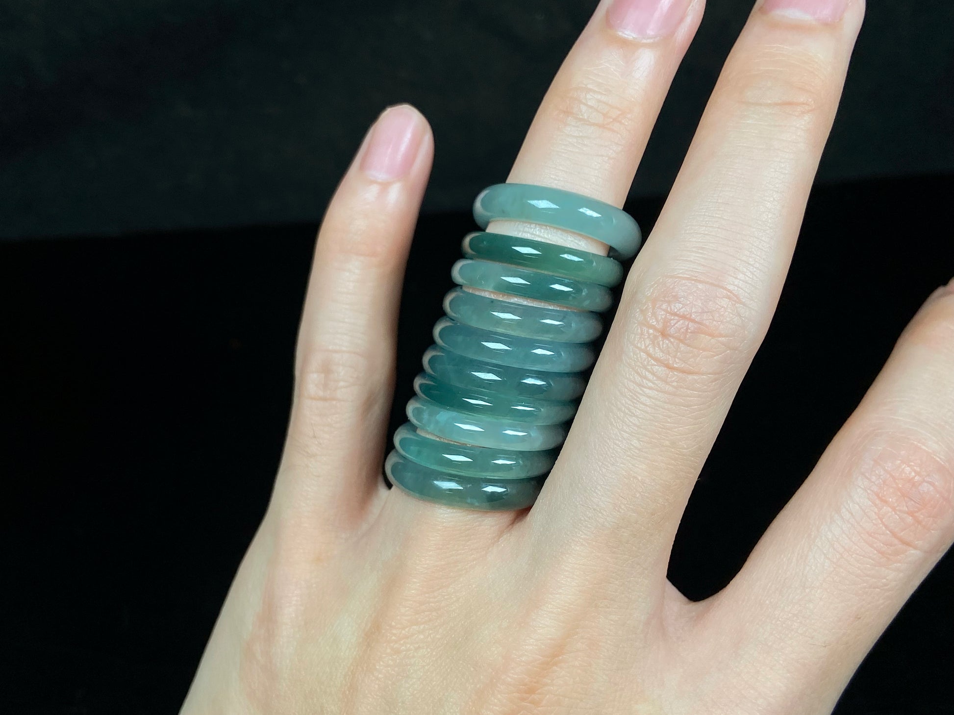 A glacial teal dew calm jadeite ring.