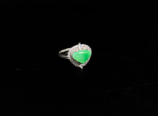 A apple green heart jadeite ring.