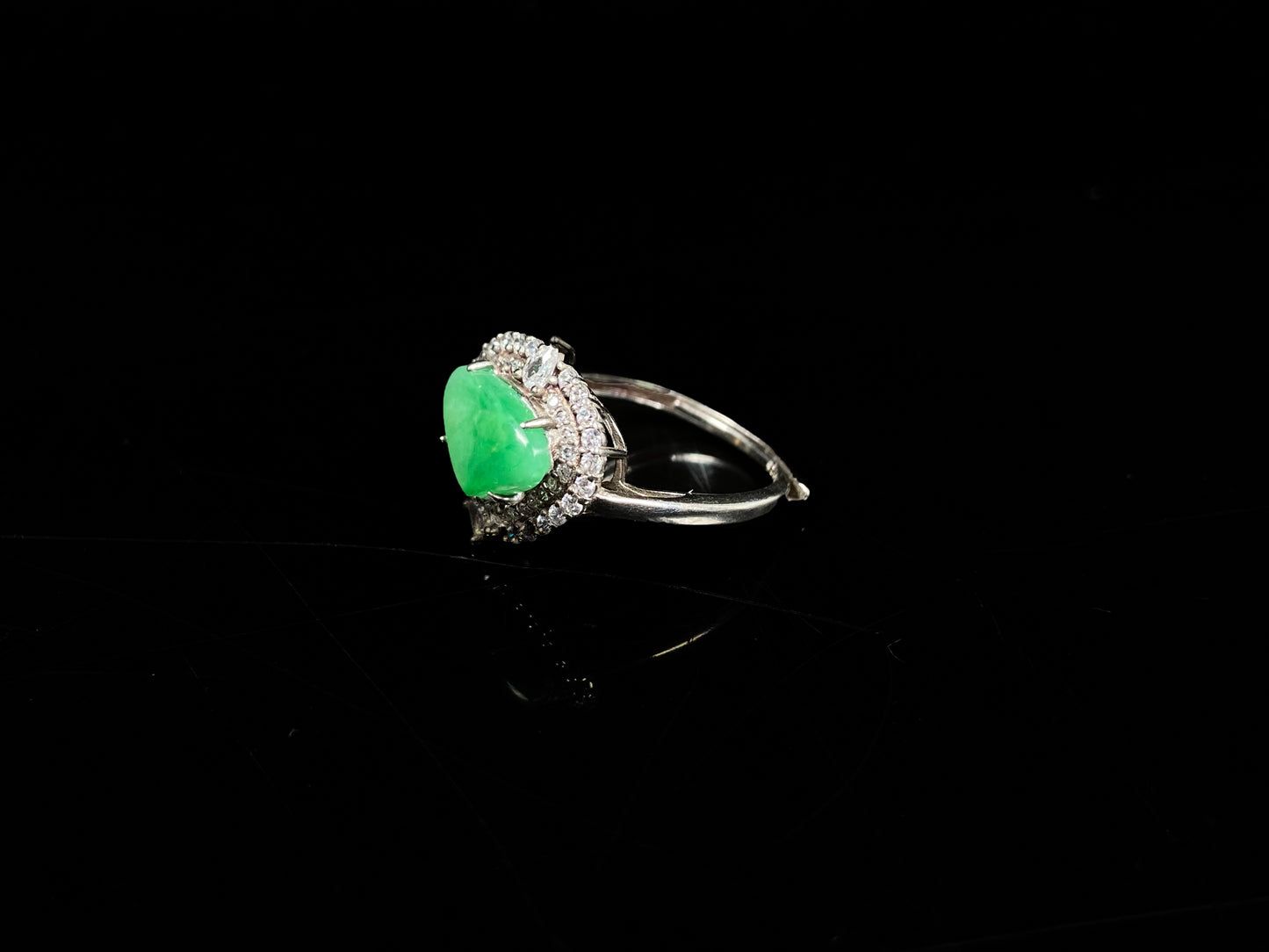 A apple green heart jadeite ring.