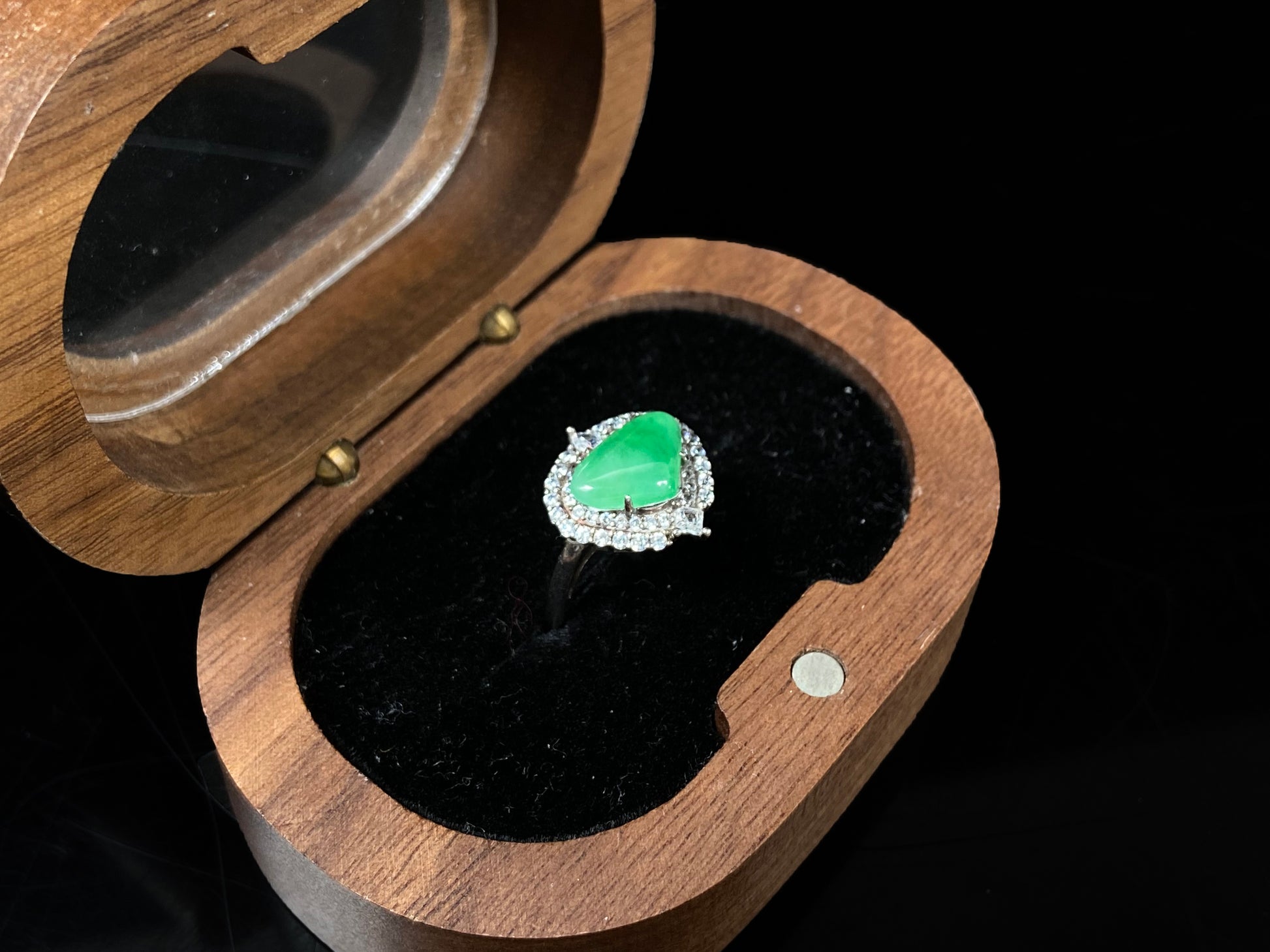 A apple green heart jadeite ring.