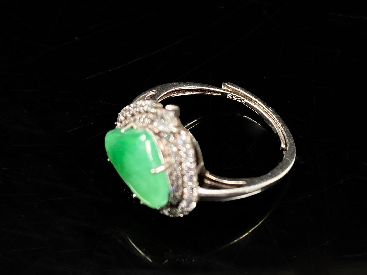 A apple green heart jadeite ring.