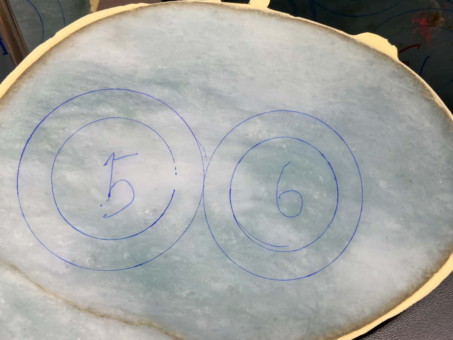 A misty blue dew jadeite bangle.