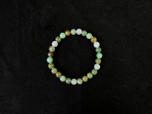 Beaded bracelet with multicolored beads on a black background